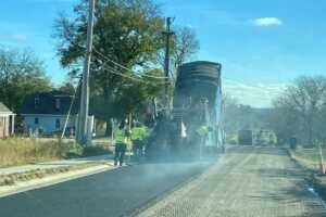 workers repaving a street