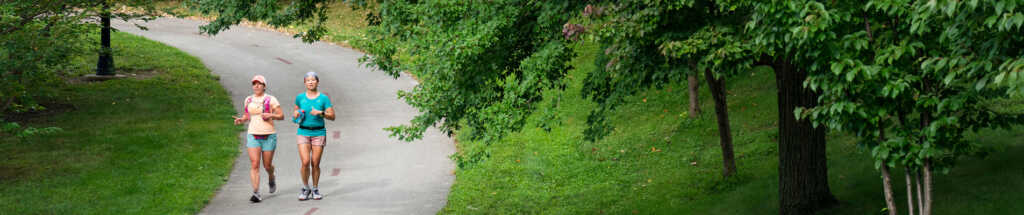 two runners on the Towpath Trail
